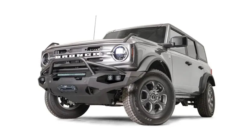 FB21-X5252-1 Fab Fours Matrix Front Bumper on a grey Ford Bronco, showcasing sleek design and exceptional durability.