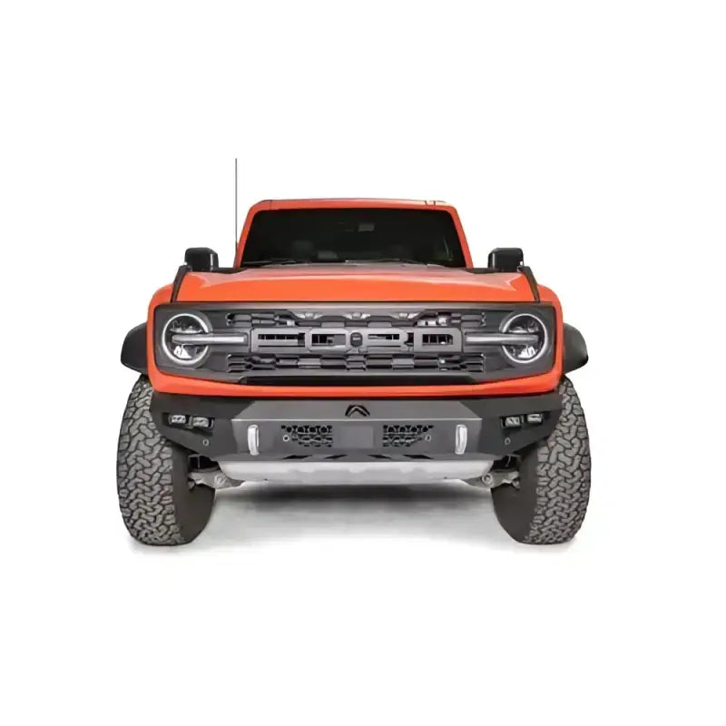 Orange Ford Bronco with Fab Fours Vengeance Front bumper for rugged style