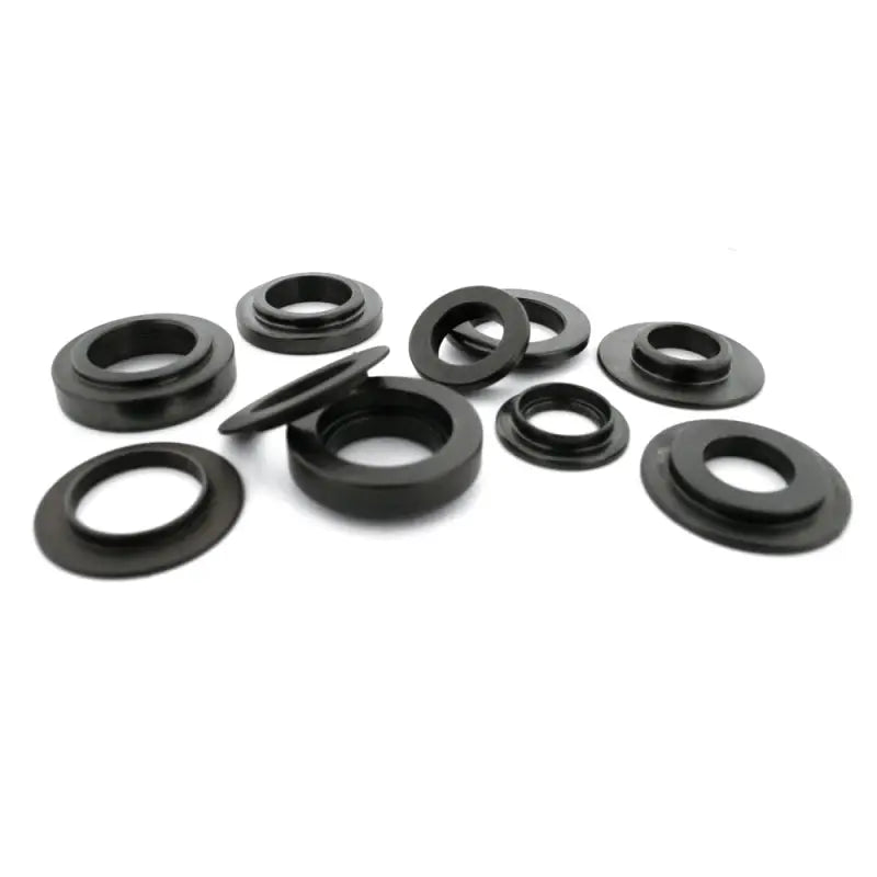 Black metal washers for spring seat locator on B18C1 engines in Honda Acura models