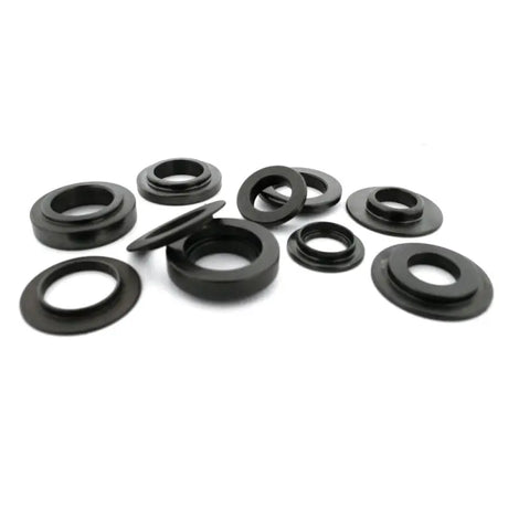 Black metal washers for spring seat locator on B18C1 engines in Honda Acura models