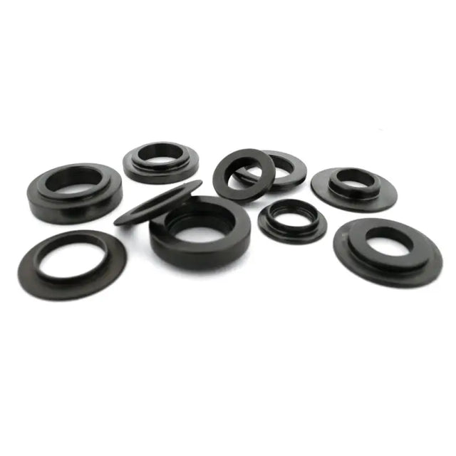 Black metal washers for spring seat locator on B18C1 engines in Honda Acura models