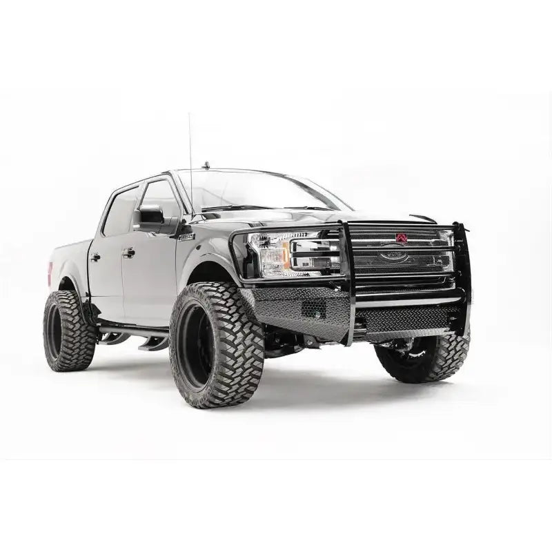 Fab Fours FF18-K4560-1 front bumper on Ford F150, showcasing rugged off-road style and added front-end protection.