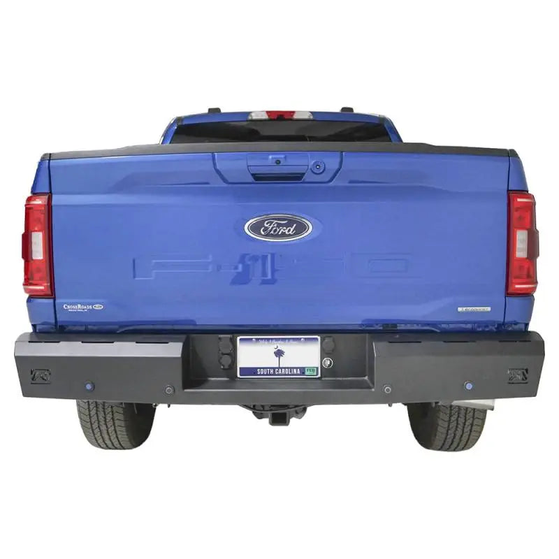 Blue Ford pickup truck with Fab Fours Red Steel Rear Bumper FF21-RT5150-1