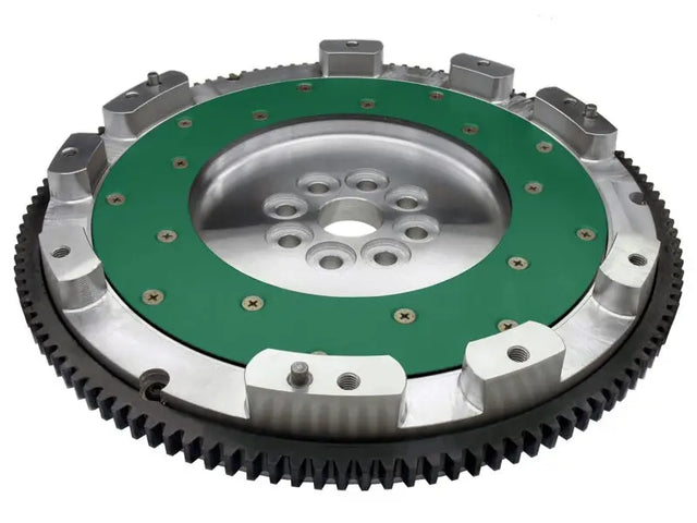 Heavy-duty STI aluminum flywheel with green friction surface and black ring gear