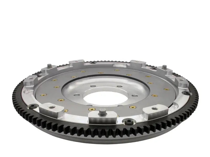 Silver and black automotive clutch assembly with outer gear ring for RX-7’s performance