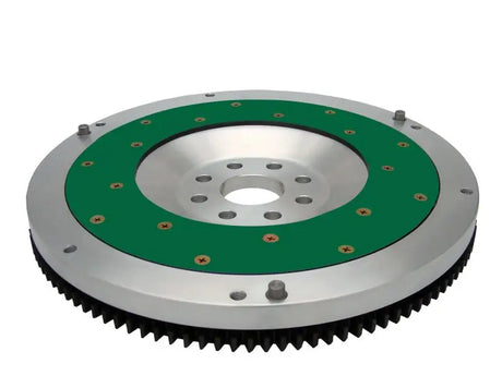 Silver and green aluminum flywheel with gear teeth for Supra 3.0L NT replaceable friction plate