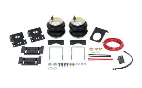 Firestone Ride-Rite Air Helper Spring Kit Rear for 2019-2020 Dodge RAM 3500 4WD, featuring air springs, brackets, tubing, and hardware for load support.