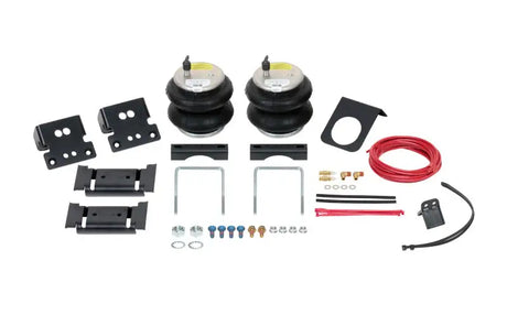 Firestone Ride-Rite Air Helper Spring Kit for Rear 2019-2020 Dodge RAM 3500 4WD, model W217602615, includes industrial-grade air springs, brackets, tubing, hardware, and fittings for easy installation.
