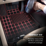 Black custom fit floor liners with red grid pattern and carbon fiber texture
