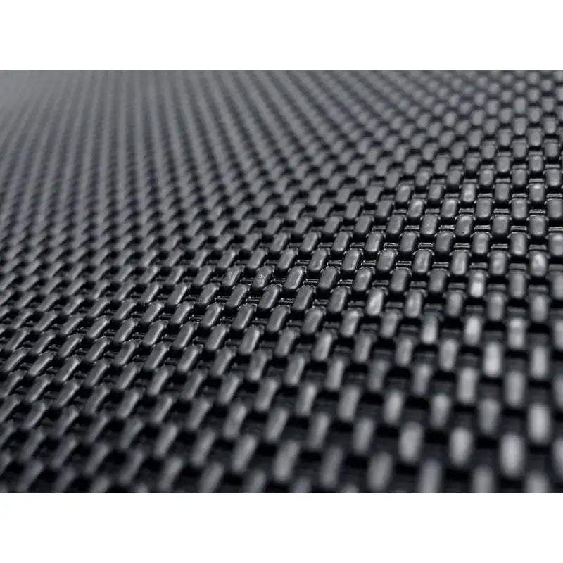 Woven black textured material on custom fit carbon fiber style floor liners