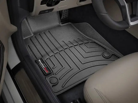 Black floor liner molded fit with channels and reservoir for cars by WeatherTech