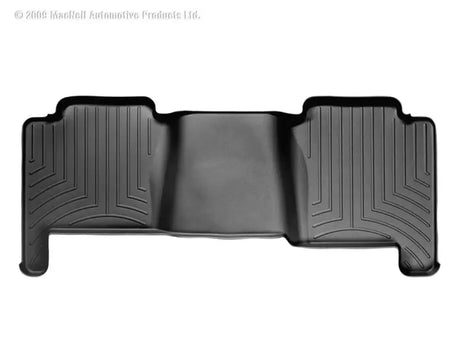 Black molded floor liner with channels and reservoir for fluids from WeatherTech