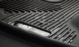 Husky Liners X-act Contour floor liner in black with raised ridge design and water-resistant thermoplastic elastomer material.