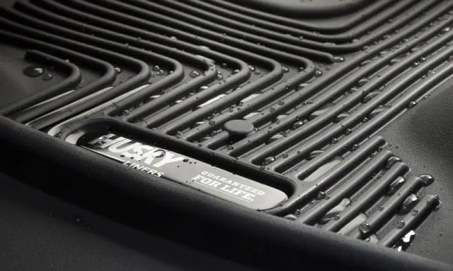 Husky Liners X-act Contour floor liner in black with raised ridge design and water-resistant thermoplastic elastomer material.