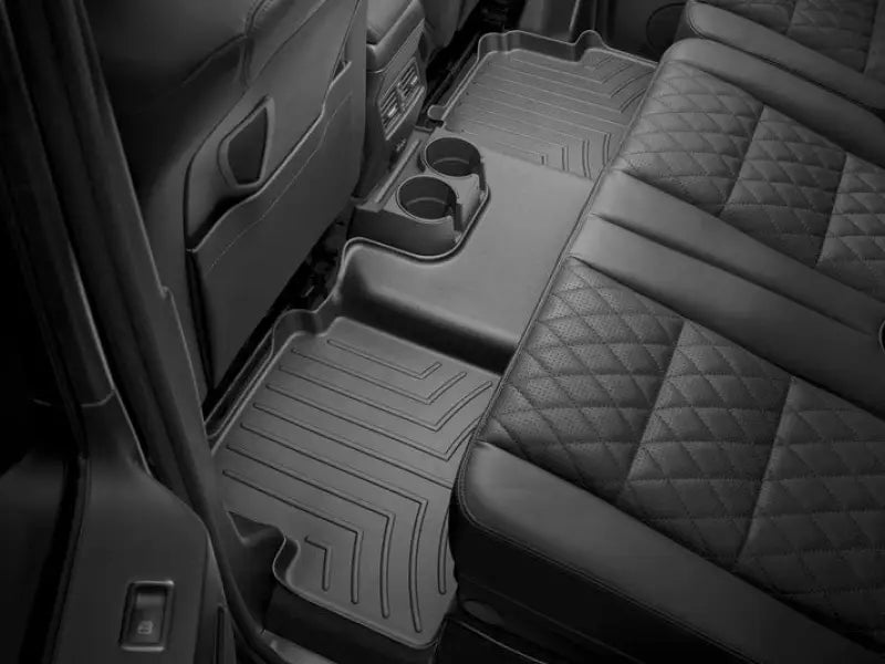 Floor Liner Molded Fit With Underside Nibs; Channels And Reservoir To Direct Hold Fluids Embossed WeatherTech Logo;