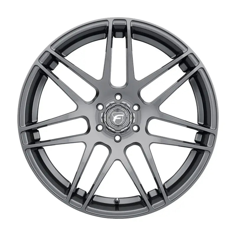 Gray multi-spoke car wheel.