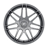 Gray multi-spoke car wheel.