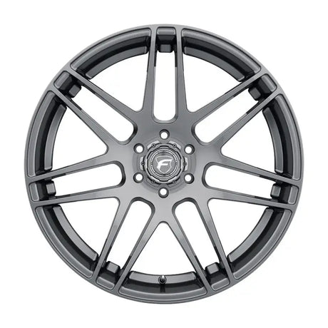 Gray multi-spoke car wheel.