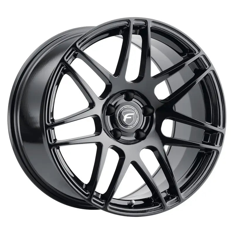 Glossy black multi-spoke wheel.