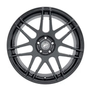 Black alloy car wheel.