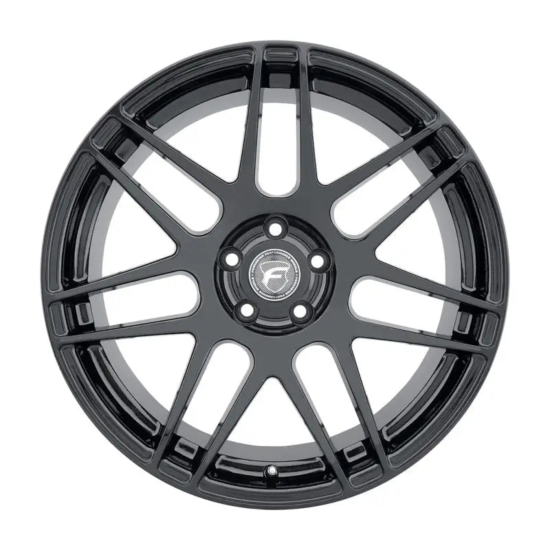 Black alloy car wheel.