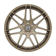 Bronze-colored car wheel.