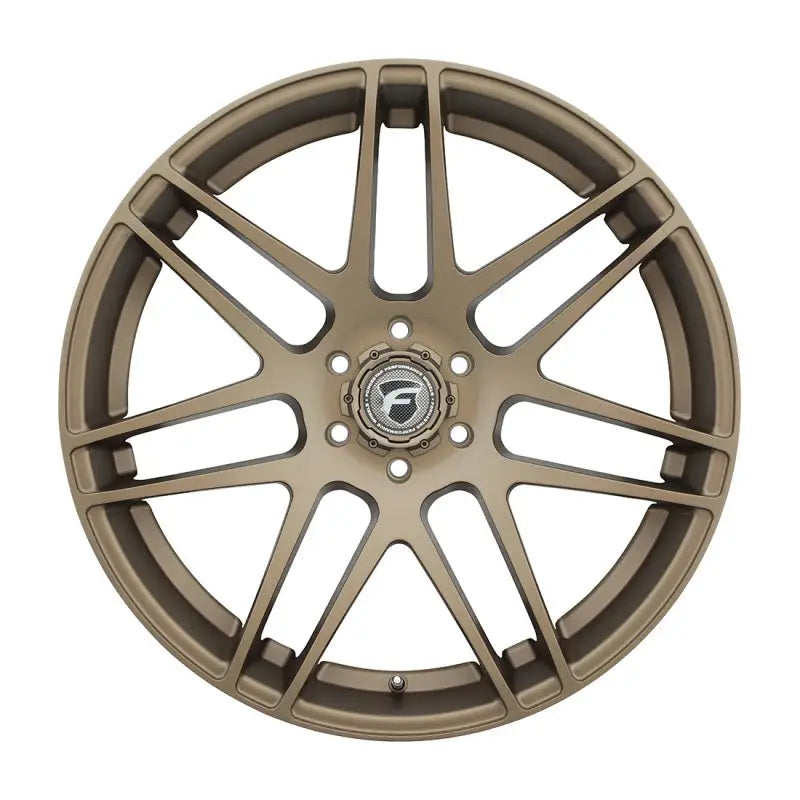 Bronze-colored car wheel.
