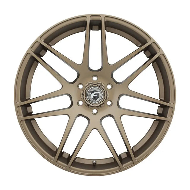 Bronze-colored car wheel.