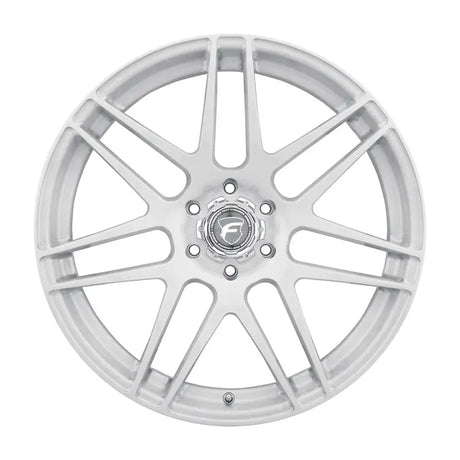 Silver multi-spoke car wheel.
