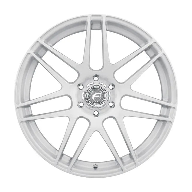 Silver multi-spoke car wheel.