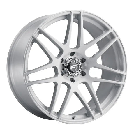 Silver car wheel with multi-spoke design.