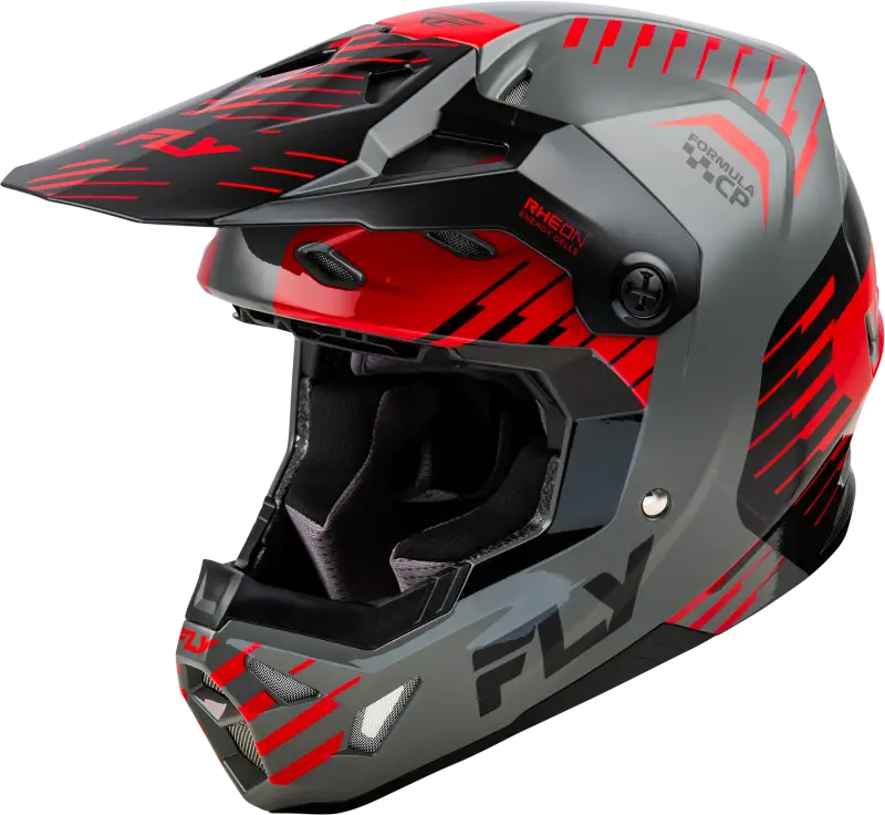 Gray and red motocross helmet with impact energy cells for extra protection