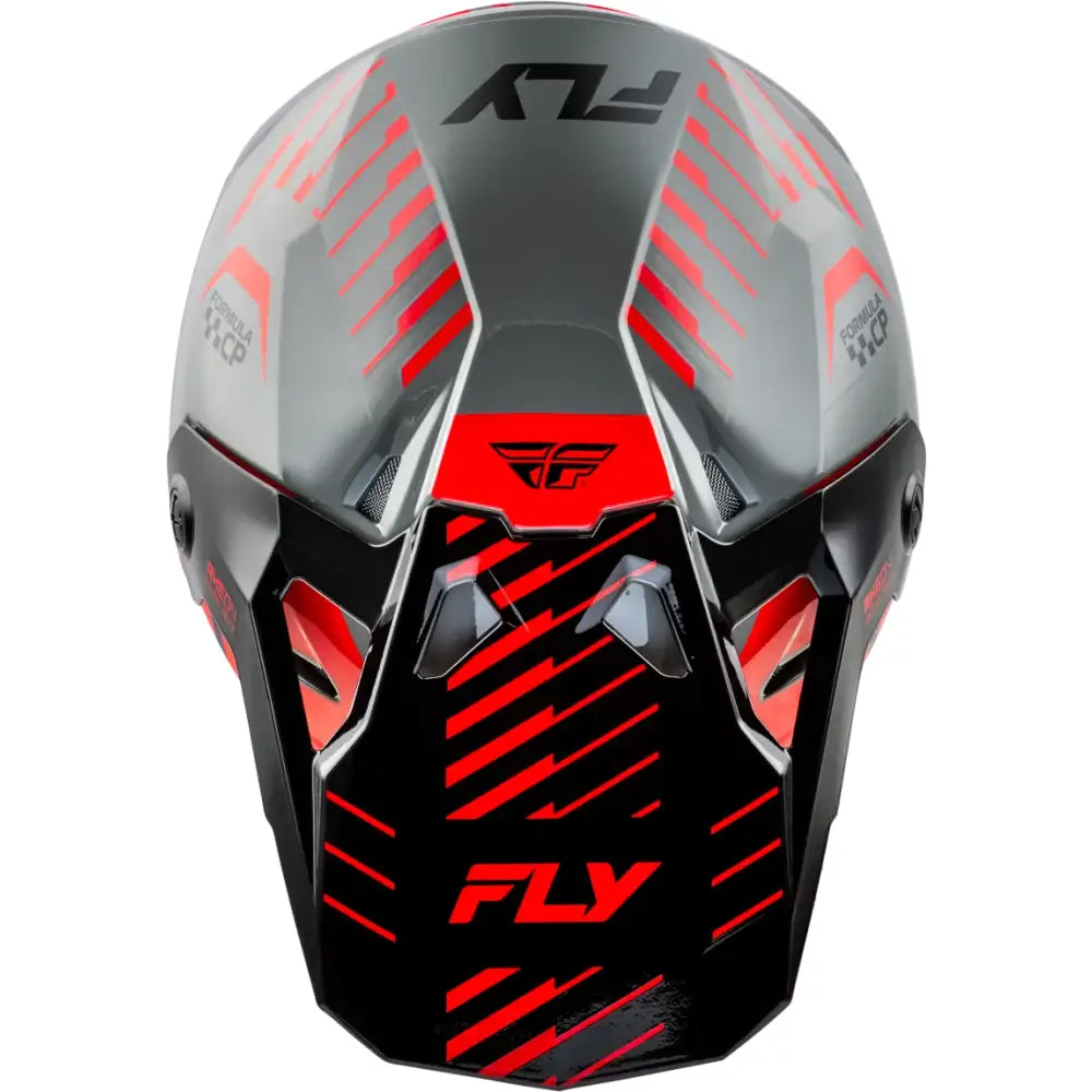 Gray and black motocross helmet with red accents featuring impact energy cells for protection