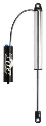 Silver and black Fox factory series coilover shock with remote reservoir for bike suspension