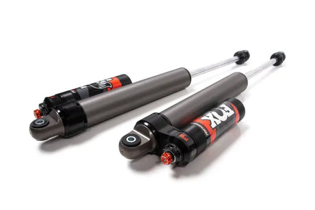 Gray and black Fox shocks for Ford F150 improve ride with superior control