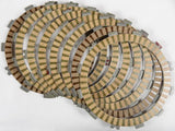 Stack of new tan and gray friction plates for multi-plate clutch FP196-9-001 with high production tolerances