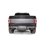 FR21-W5351-1 Fab Fours Premium Rear bumper installed on Ford F-150 Raptor, showcasing its rugged design and durable construction for enhanced rear-end protection.