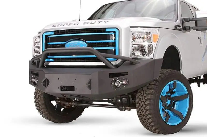 Fab Fours 2011-2016 Ford Super Duty F250-F550 Red Steel Bumper installed on a white truck, showcasing rugged design and superior strength for both on and off-road use, Bumpers, Grilles & Guards, AVADA - Best Sellers, Must Haves.