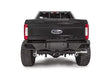 Rear view of a Ford Super Duty F250-F350 equipped with FS17-E4151-1 Fab Fours Ven Sen R bumper, showcasing its rugged and stylish design.