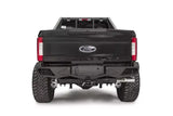 Rear view of a Ford Super Duty F250-F350 equipped with FS17-E4151-1 Fab Fours Ven Sen R bumper, showcasing its rugged and stylish design.