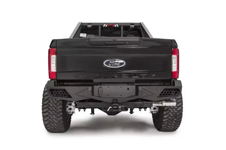 Rear view of a Ford Super Duty F250-F350 equipped with FS17-E4151-1 Fab Fours Ven Sen R bumper, showcasing its rugged and stylish design.
