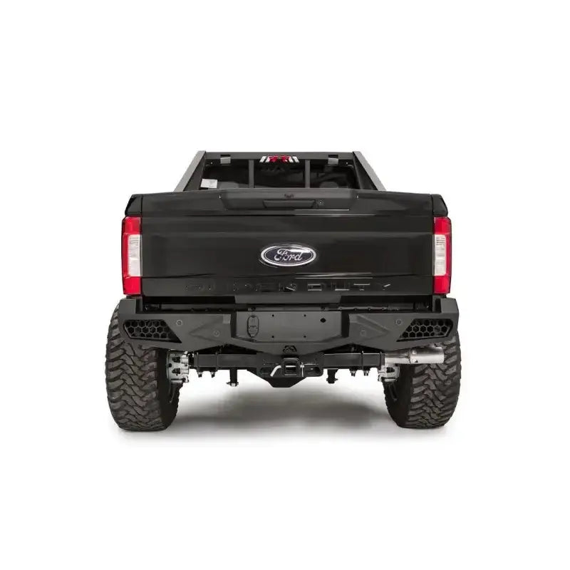 Rear view of a black Ford F250 equipped with FS17-E4151-1 Fab Fours 17 Ven Sen R, showcasing its rugged design and enhanced protection features.