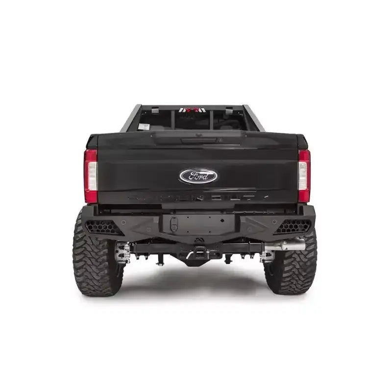 Rear view of a Ford Super Duty F250-F350 equipped with FS17-E4151-1 Fab Fours Ven Sen R bumper, showcasing its rugged and stylish design.