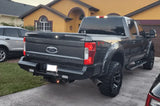 Ford F250 truck equipped with FS17-T4150-1 Fab Fours 17 Fd F250-350 Ranch Rear bumper for enhanced protection and style.