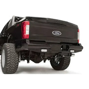 FS17-T4150-1 Fab Fours rear bumper on Ford F250/F350 truck, showcasing robust construction and sleek design for enhanced protection.
