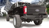 FS17-U4150-1 Fab Fours rear bumper on a Ford F250/F350 Super Duty in a mountain setting.