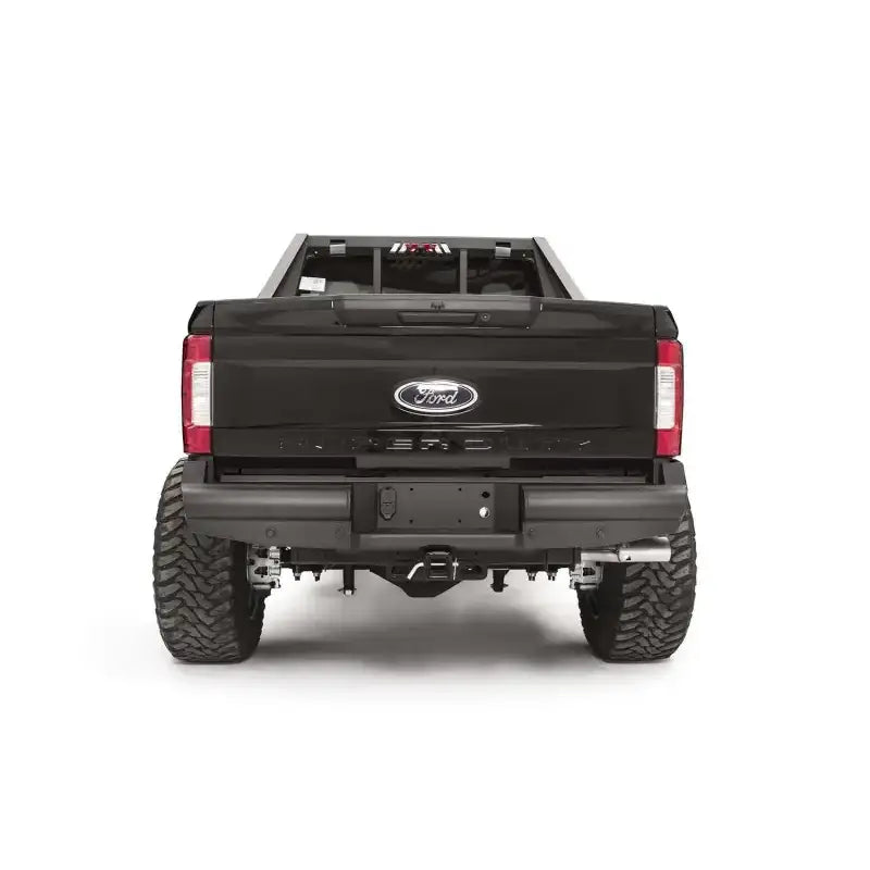 Elegant and durable Fab Fours FS17-U4150-1 rear bumper on a Ford Super Duty F250/F350, showcasing exceptional style and rear-end protection.
