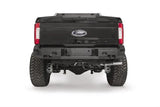 Rear view of a Ford F250/F350 truck fitted with Fab Fours FS17-W4151-1 rear sensor bumper for enhanced protection and style.