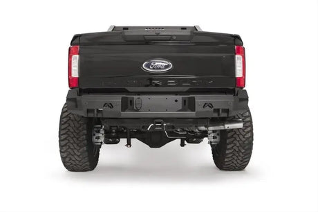 Rear view of a Ford F250/F350 truck fitted with Fab Fours FS17-W4151-1 rear sensor bumper for enhanced protection and style.