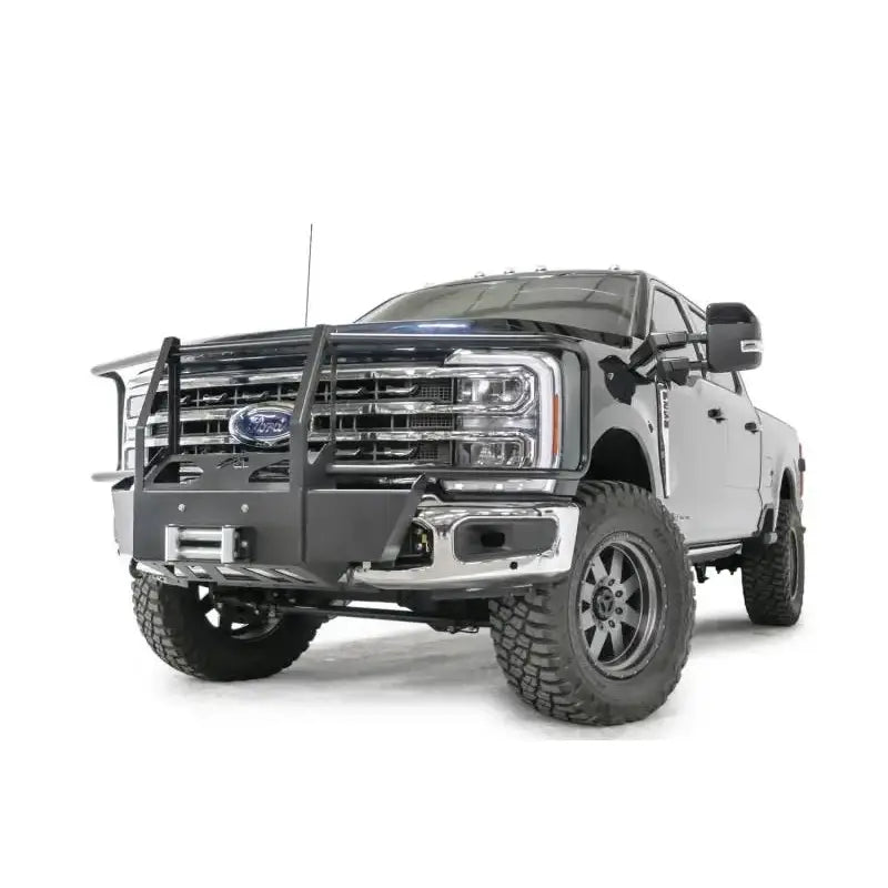 FS23-N5970-1 Fab Fours Winch Mount installed on a heavy-duty truck, enhancing off-road capability and providing durable, stable winch mounting. Ideal for RV, Automotive, Powersports, exterior, truck accessories, Winches & Hitches, AVADA - Best Sellers, Must Haves